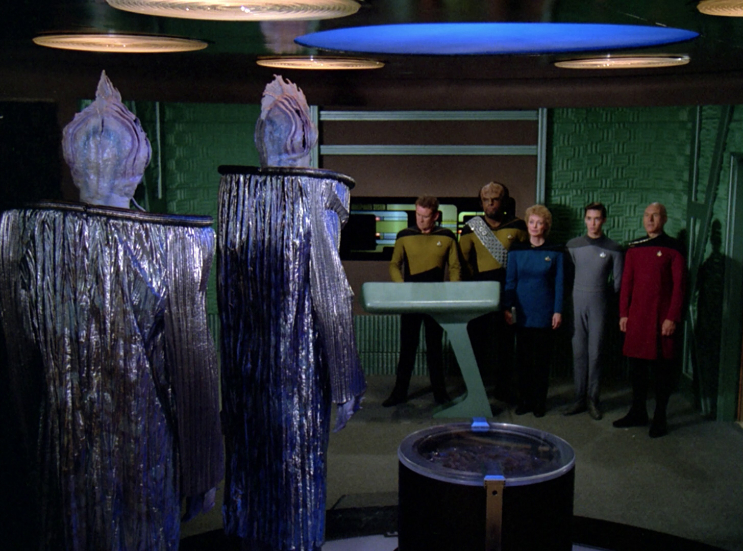 The characters come across as seen in this photo: small and out of focus