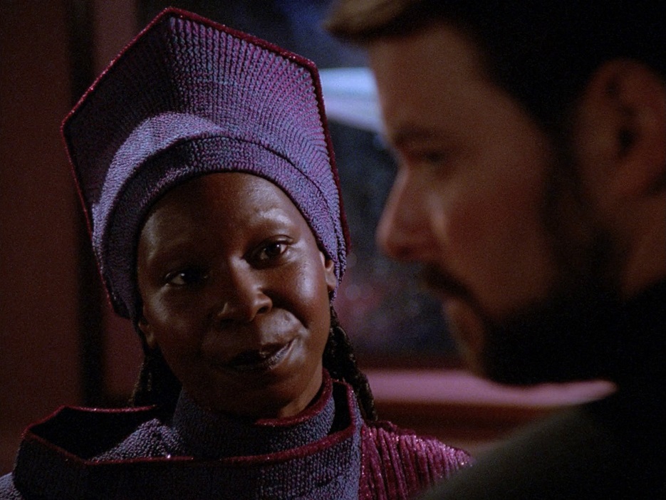Guinan giving Riker a much-needed kick in the pants